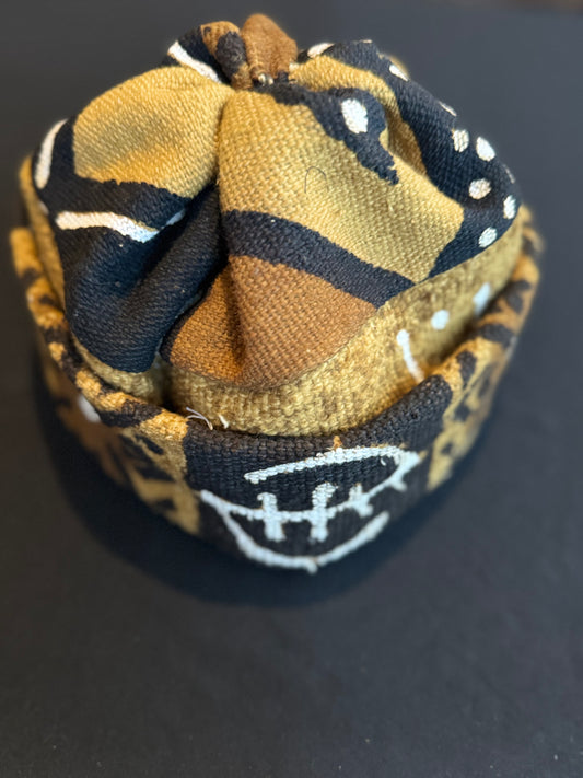 Bogolan beanie with adinkra symbols