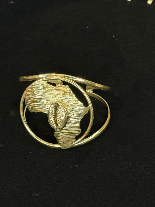 Gold Plated Brass Bracelet with Africa and cowrie shell accent