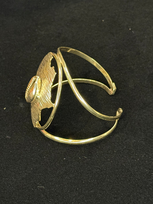 Gold Plated Brass Bracelet with Africa and cowrie shell accent